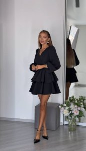 Išskirtinio dizaino suknelė